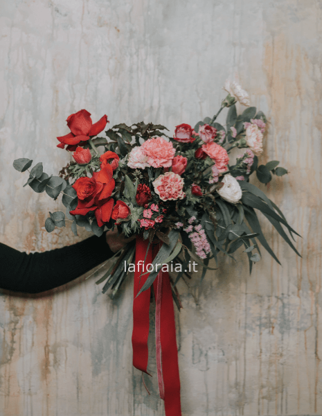 Bouquet misto nei toni del rosso e del rosa S